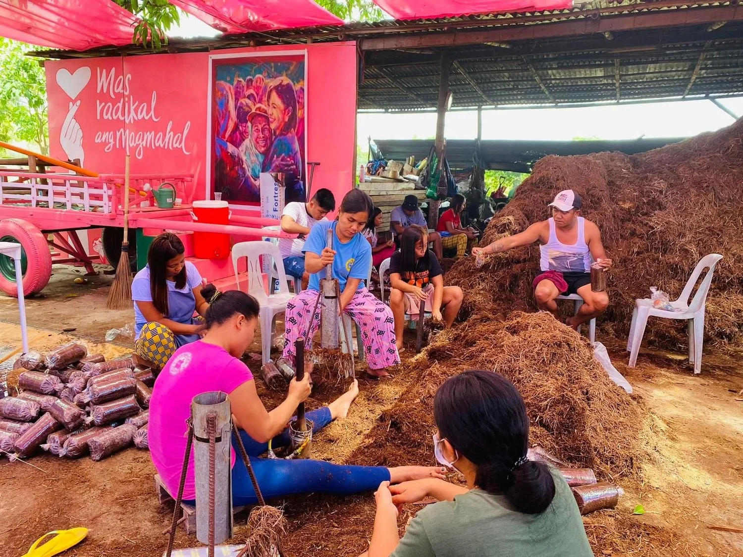 Participants preparing mushroom growing bags during an Ako Ang Saklay livelihood activity